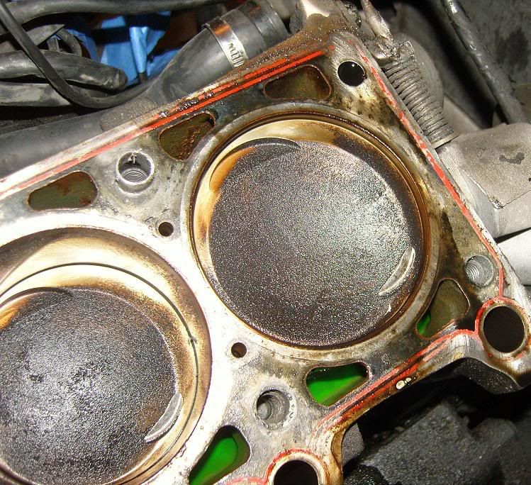 hole in piston and dinged up combustion chamber