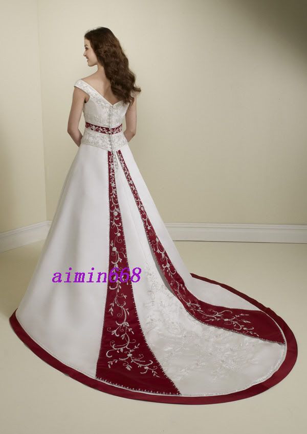 White Wedding Gown With Black Accents. Wedding Dresses White