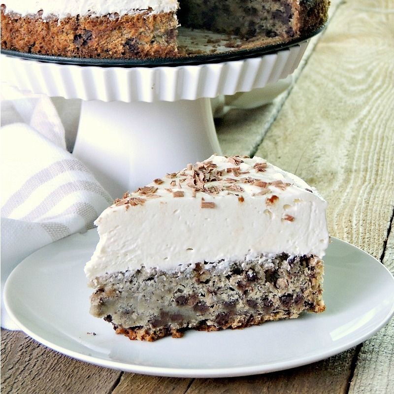 Two delicious desserts, in one place. Moist chocolate chip banana bread topped with a creamy, no-bake cheesecake from www.bobbiskozykitchen.com