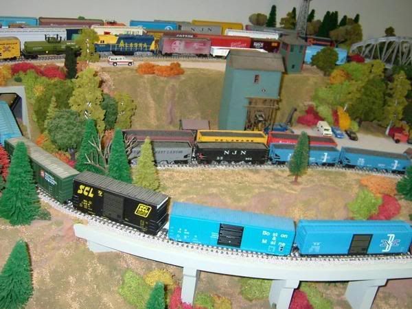 Here's pics of my HO layout in the basement.