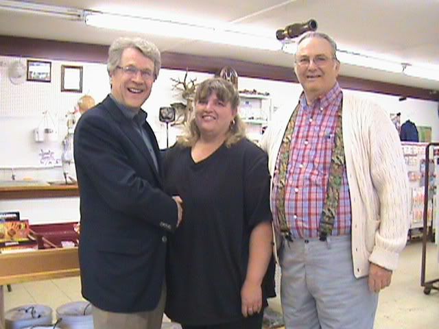 Stop Light Bait owner Laurie Hansen and assistant Jim Postle welcome Tom Horner to their business, May 12, 2010.