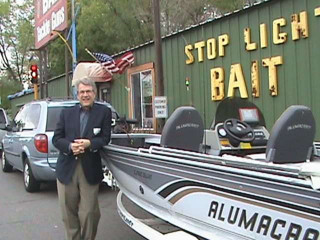 Tom Horner arrives at Stop Light Bait in St. Cloud for a press conference ahead of Minnesota's fishing opener, May 12, 2010.